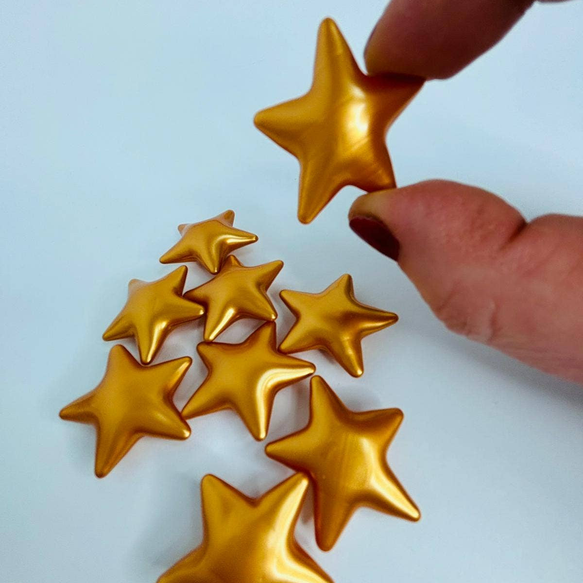 Gold Star Bath Pearls.